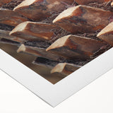 Art deco poster featuring a close-up of trees in muted green and brown tones on rolled canvas.