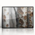Large abstract wall art featuring close-up tree designs in black and white, framed in acrylic.