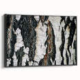 Black and white framed canvas featuring a close-up view of tree trunks, ideal for bedroom wall decor.