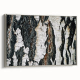Silver-framed canvas featuring close-up of trees in black and white, ideal for bedroom wall art.