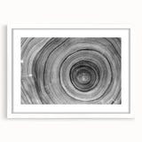 Abstract art print of close-up trees in muted green and beige tones on a white framed canvas, suitable for dining room decor.