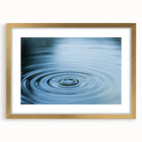Extra large abstract art print featuring textured blue and green swirls, framed in gold, ideal for living room decor.