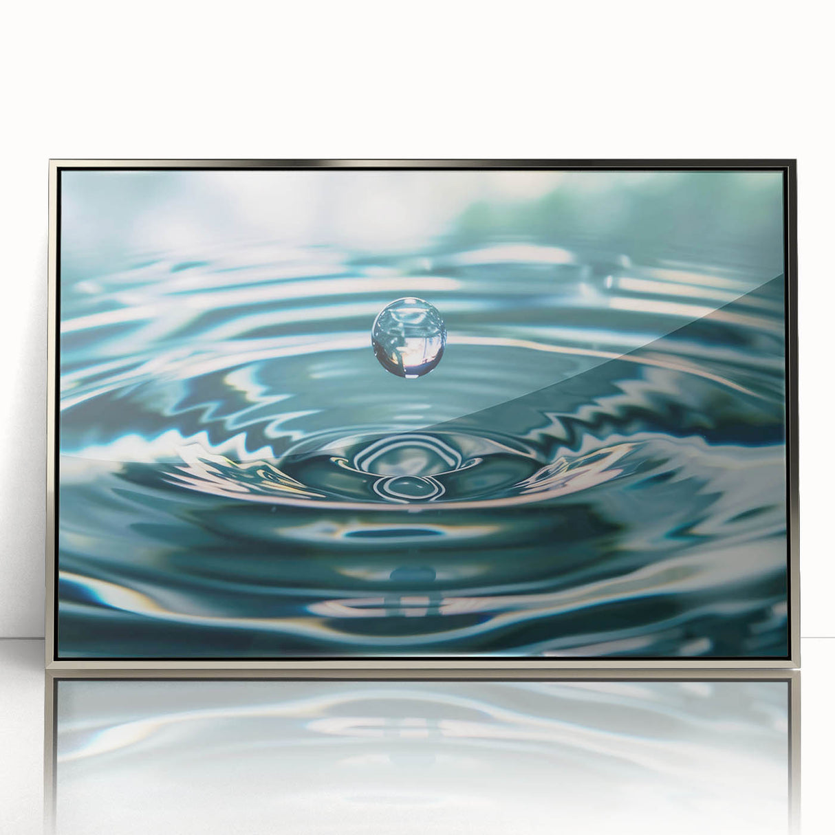 Mid-century modernist art depicting a close-up water design in silver and blue tones on a framed acrylic.