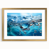 Extra large abstract art print featuring textured water design in gold frame, suited for living room decor.