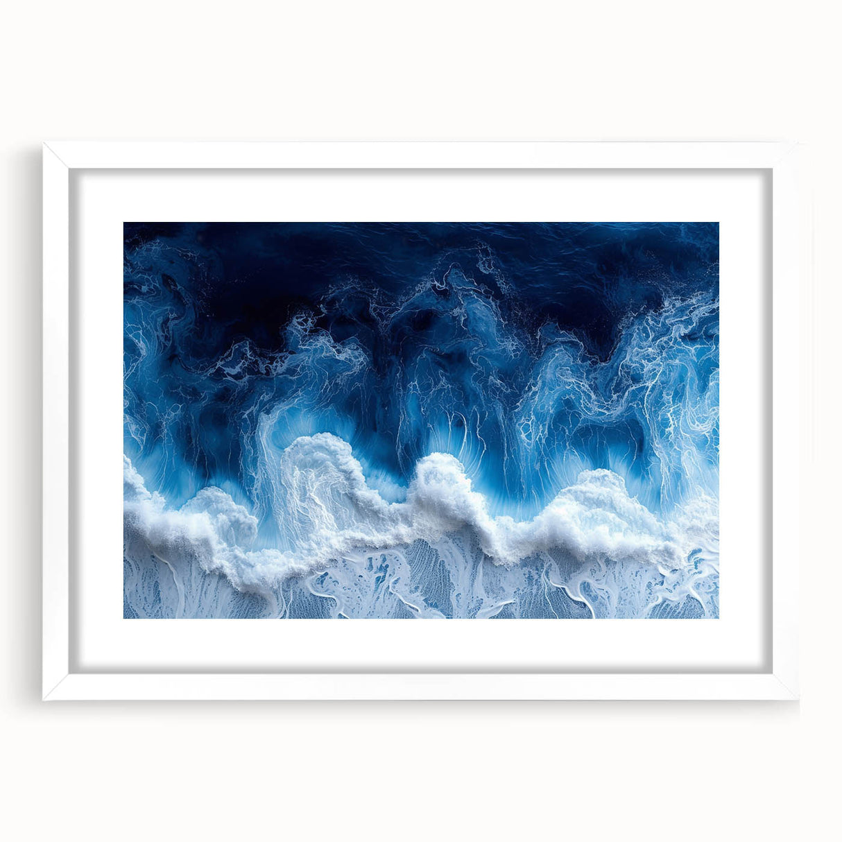 Abstract art print featuring close-up water patterns in blue and white tones, framed in white.