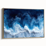 Framed canvas featuring a close-up water design in muted blue and black tones, suitable as wall art for a bedroom.