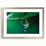 Textured art print featuring abstract ripples in gray and blue tones on a silver-framed mat, ideal for bedroom art.