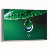 Framed canvas of a close-up water landscape painting in vibrant blue and silver tones, suitable for modern living room decor.