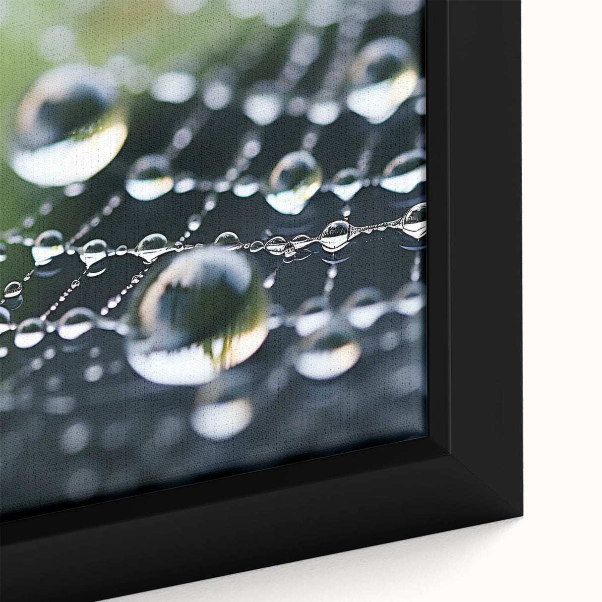 Close-up of black wall art featuring a colorful, textured water design on a framed canvas, ideal for living room decor.