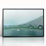 Large abstract wall art featuring swirling blue and green patterns on framed acrylic, ideal for modern living room decor.