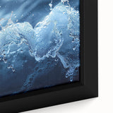 Close-up of textured black wall art featuring colorful, abstract water design on a framed canvas.