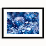 Extra large abstract art print featuring a close-up water design in vibrant blue and green hues, framed in black.