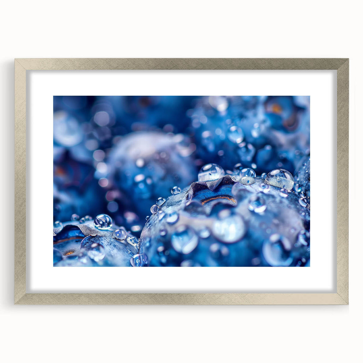 Textured art print of abstract ripples in muted blue and gray, framed in silver, ideal for bedroom wall decor.