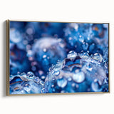 Framed canvas featuring a close-up of water in nature, in muted blue and gray tones, ideal for bedroom wall art.