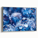 Framed canvas depicting a close-up water landscape in muted blue and gray tones, ideal for living room decor.