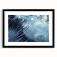 Extra large abstract art print featuring a textured, colorful water design in a black frame with mat.