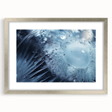 Textured art print of abstract water ripples in silver frame, muted blue tones, ideal for bedroom art.