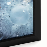 Close-up of a black framed canvas featuring a textured, colorful abstract design, ideal for extra-large living room wall art.