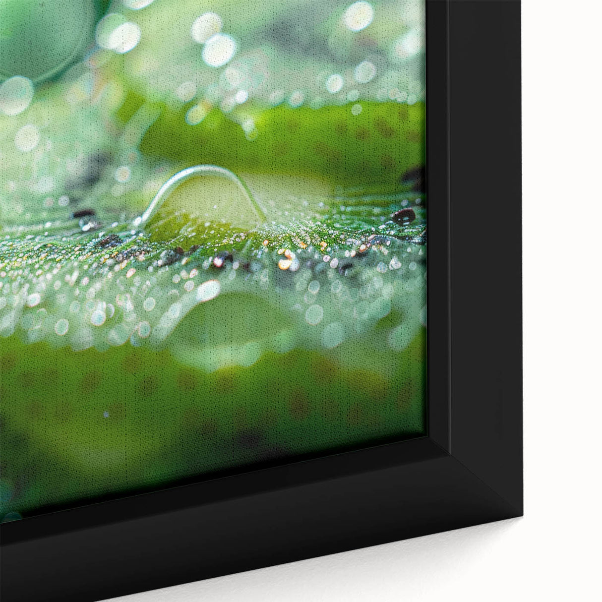 Close-up of black wall art featuring a textured, colorful abstract design on a framed canvas, ideal for living room decor.