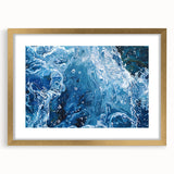 Extra large textured abstract art print depicting swirling water, in a gold frame with mat, ideal for living room decor.
