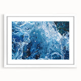 Abstract art print featuring swirling blue and white patterns on a framed canvas, suitable for dining room or bedroom decor.
