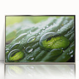 Mid-century modernist art depicting abstract water patterns in cool blue and silver tones on a framed acrylic.