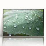 Mid-century modernist art depicting close-up water ripples in muted blue and silver tones on a framed acrylic.