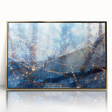 Close-up of water ripples in muted blue and gray tones, framed in gold acrylic, suitable for modern art wall decor.