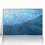 Close-up of water droplets on leaf in a white framed acrylic, with a modern art style, suitable for nursery wall decor.