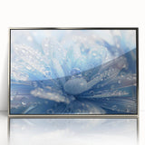 Mid-century modernist art depicting close-up water ripples in muted blue and silver tones on a framed acrylic.