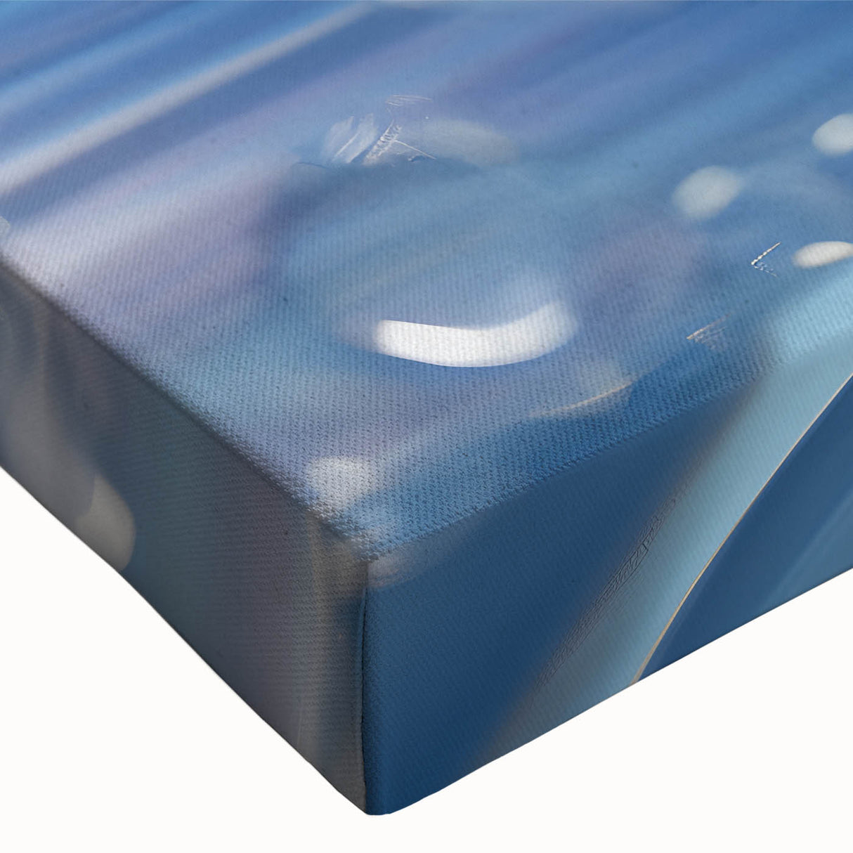 Large art depicting a close-up water ripple in black and white on stretched canvas, suitable for bedroom wall decor.