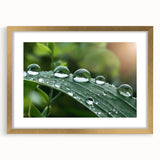 Extra large abstract art print featuring textured water design in muted blue and gray, framed in gold.