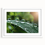 Abstract art print featuring swirling blue and green patterns, framed in white, suitable for dining room or bedroom decor.