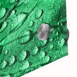 Large abstract wall art on acrylic glass featuring a close-up water design with blue and green hues.