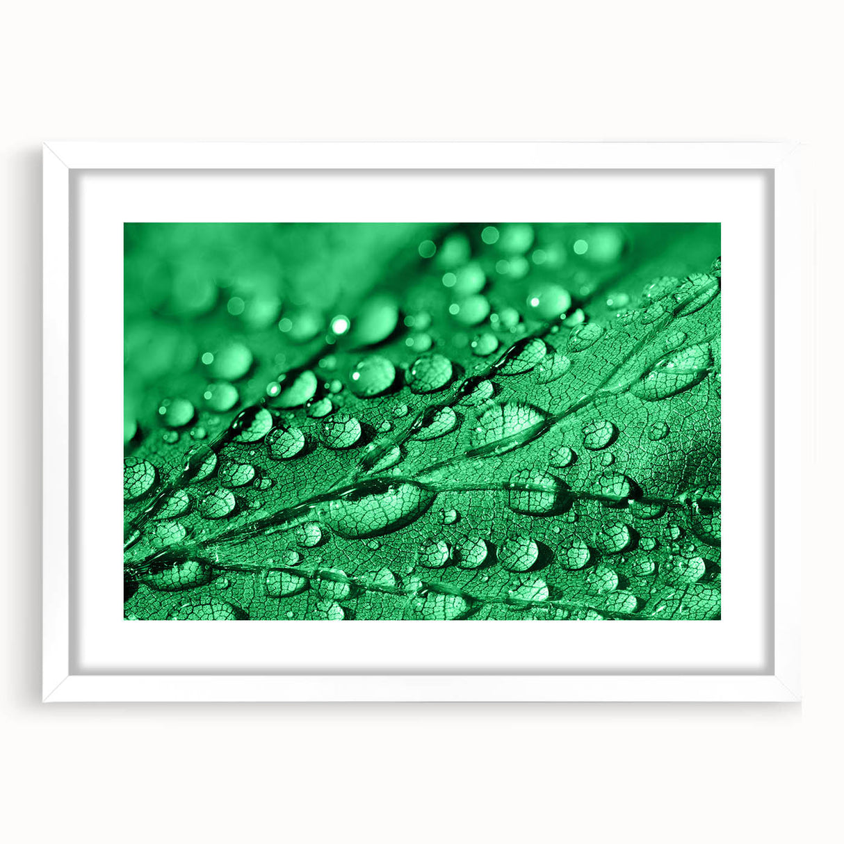 Abstract art print featuring close-up water design in muted blue and white tones, framed with a white mat.