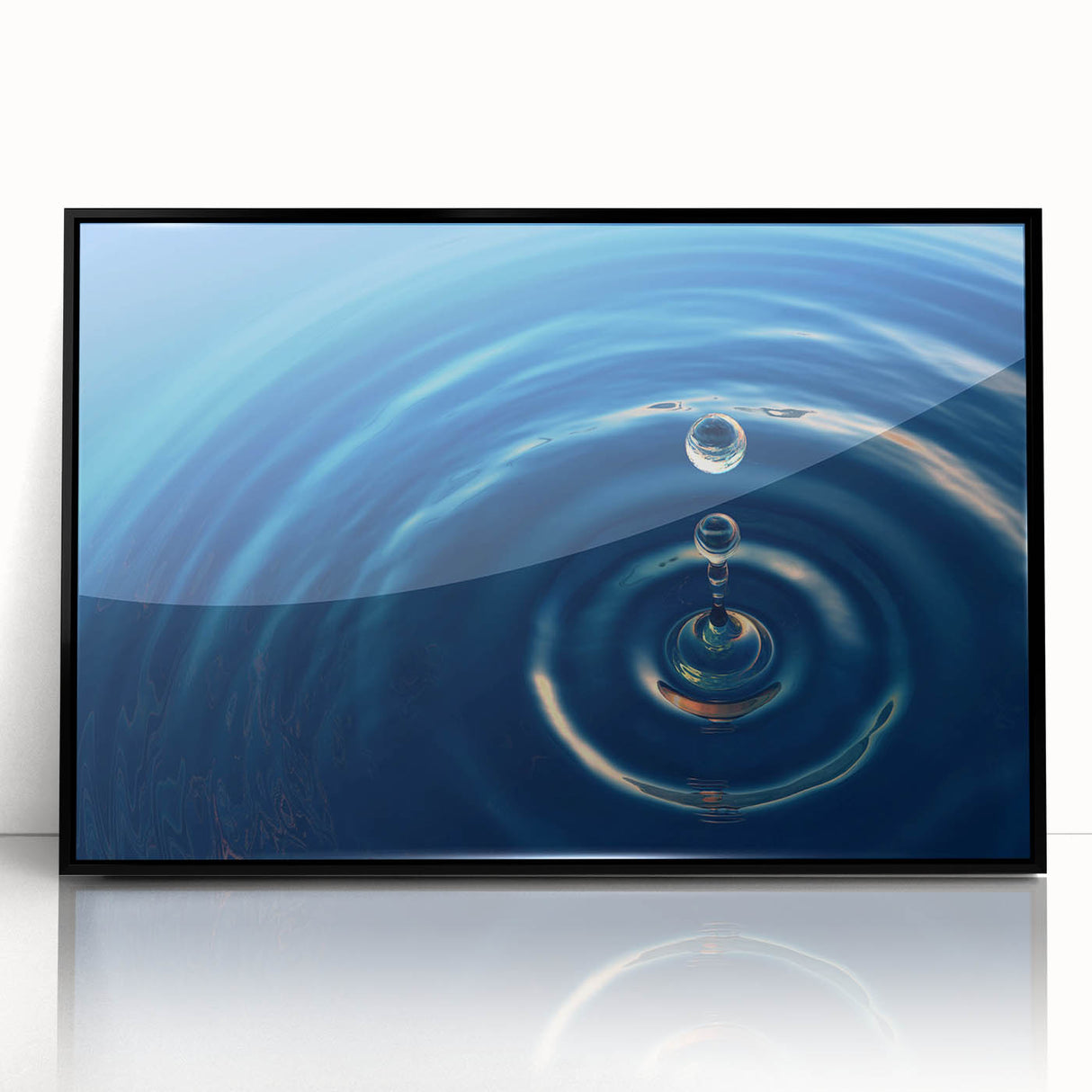 Large abstract wall art featuring swirling blue and white patterns on a framed acrylic, suitable for modern art wall decor.