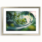Textured abstract art print in blue and green hues, framed in silver, suitable for bedroom decor.