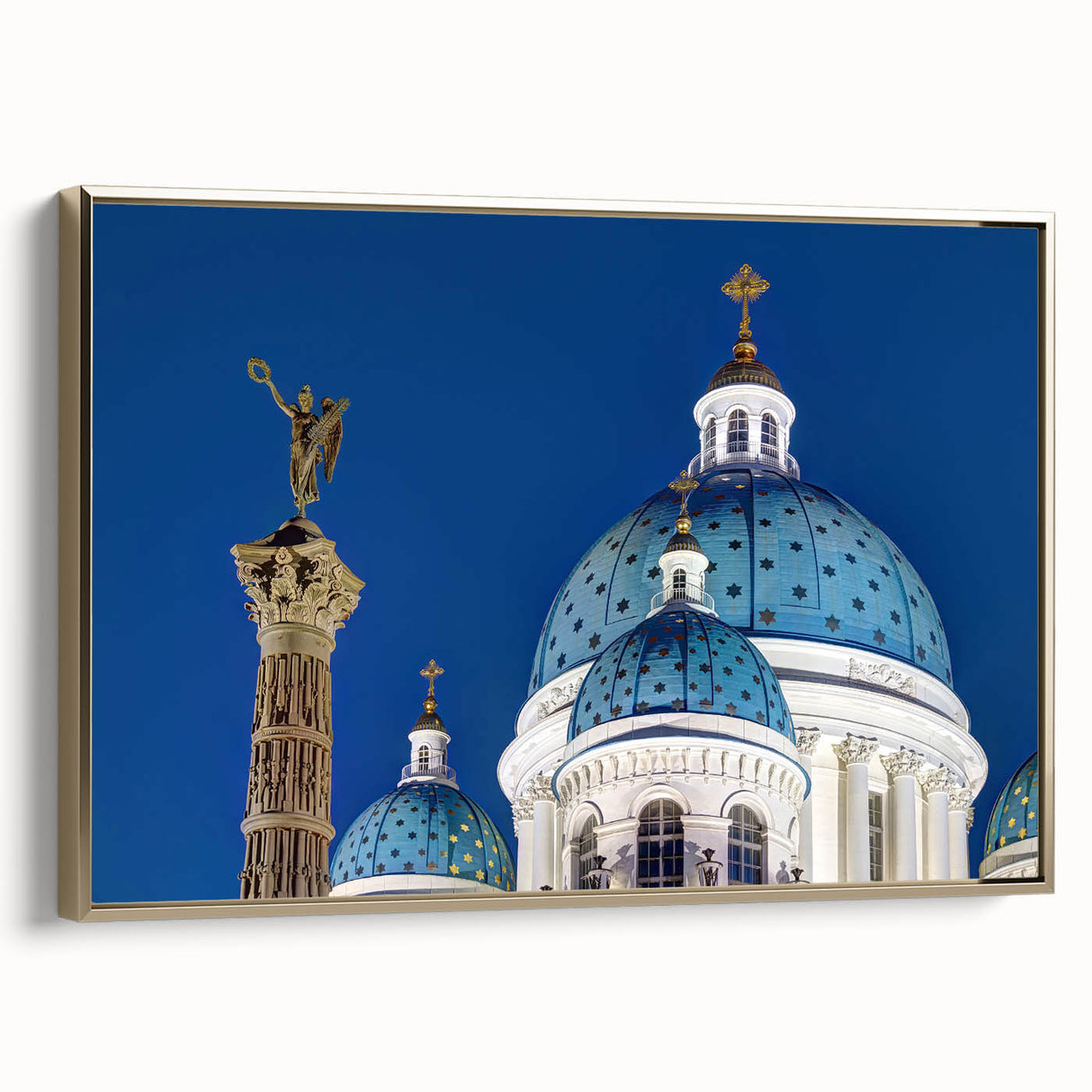 Framed canvas featuring a vintage poster art of a cathedral in muted gold and black tones.
