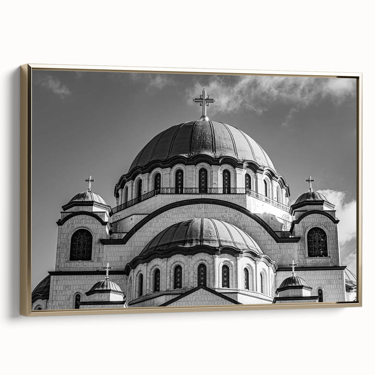 Framed canvas of a vintage cathedral landscape painting in muted gold and black tones, ideal for living room decor.