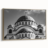 Framed canvas of a vintage cathedral landscape painting in muted gold and black tones, ideal for living room decor.