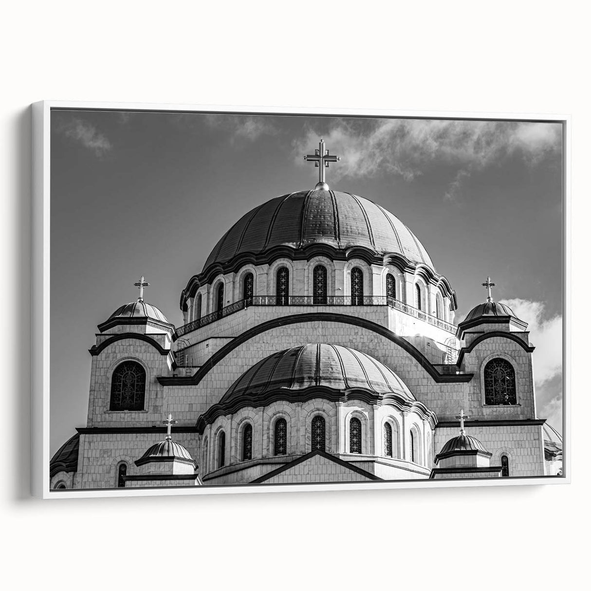 Framed canvas of a vintage-style cathedral landscape in muted black and white tones, ideal for bedroom wall decor.