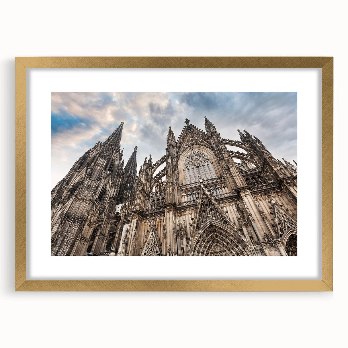 Textured abstract art print depicting a cathedral, in gold frame with mat, using muted earth tones, ideal for bedroom art.