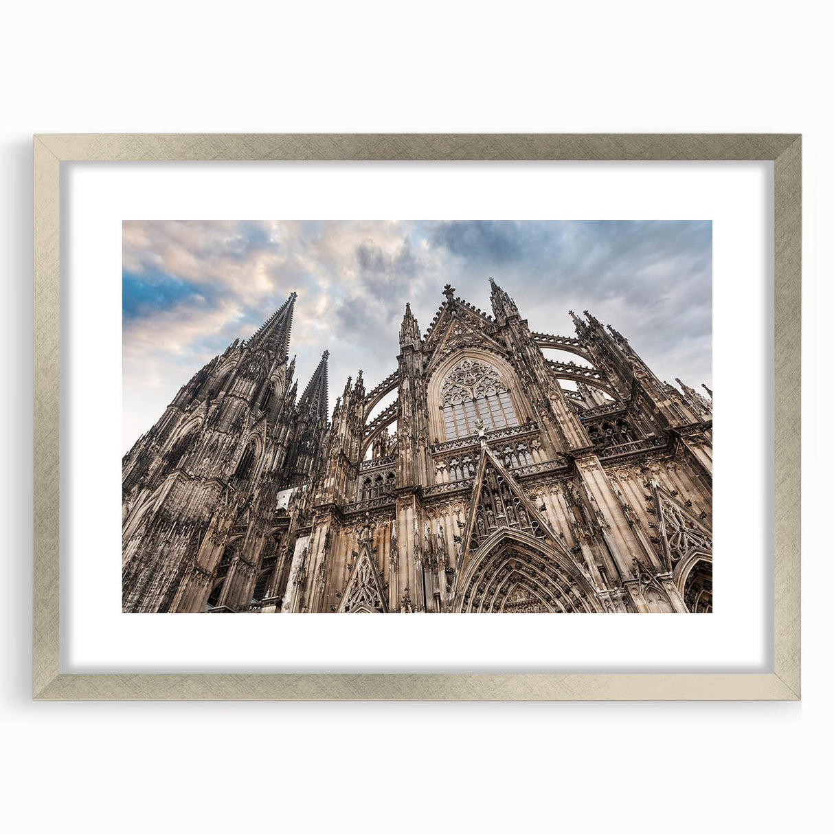 Abstract art print of a cathedral design in silver frame with mat, featuring geometric shapes and cool gray tones.