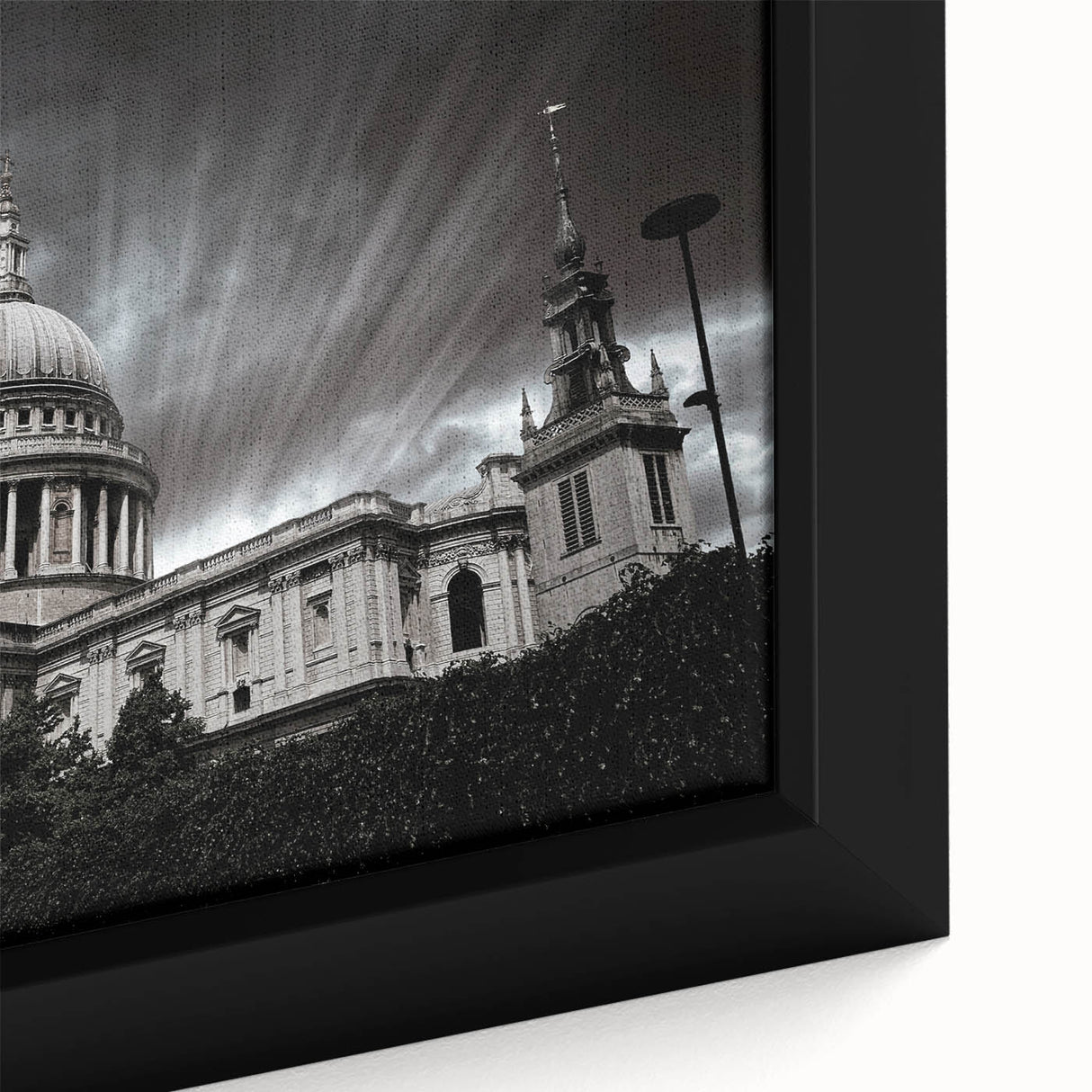 Extra large framed canvas featuring a black textured depiction of a cathedral, highlighted with colorful art accents.