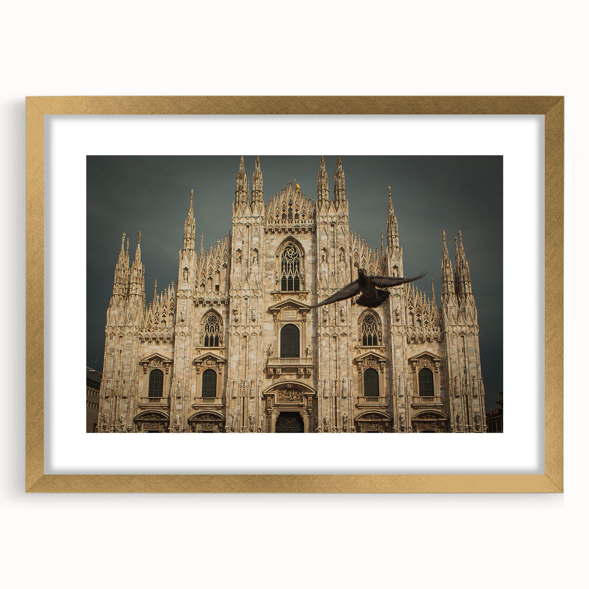 Textured abstract art print of a cathedral design in muted gold and beige tones, framed with a mat.