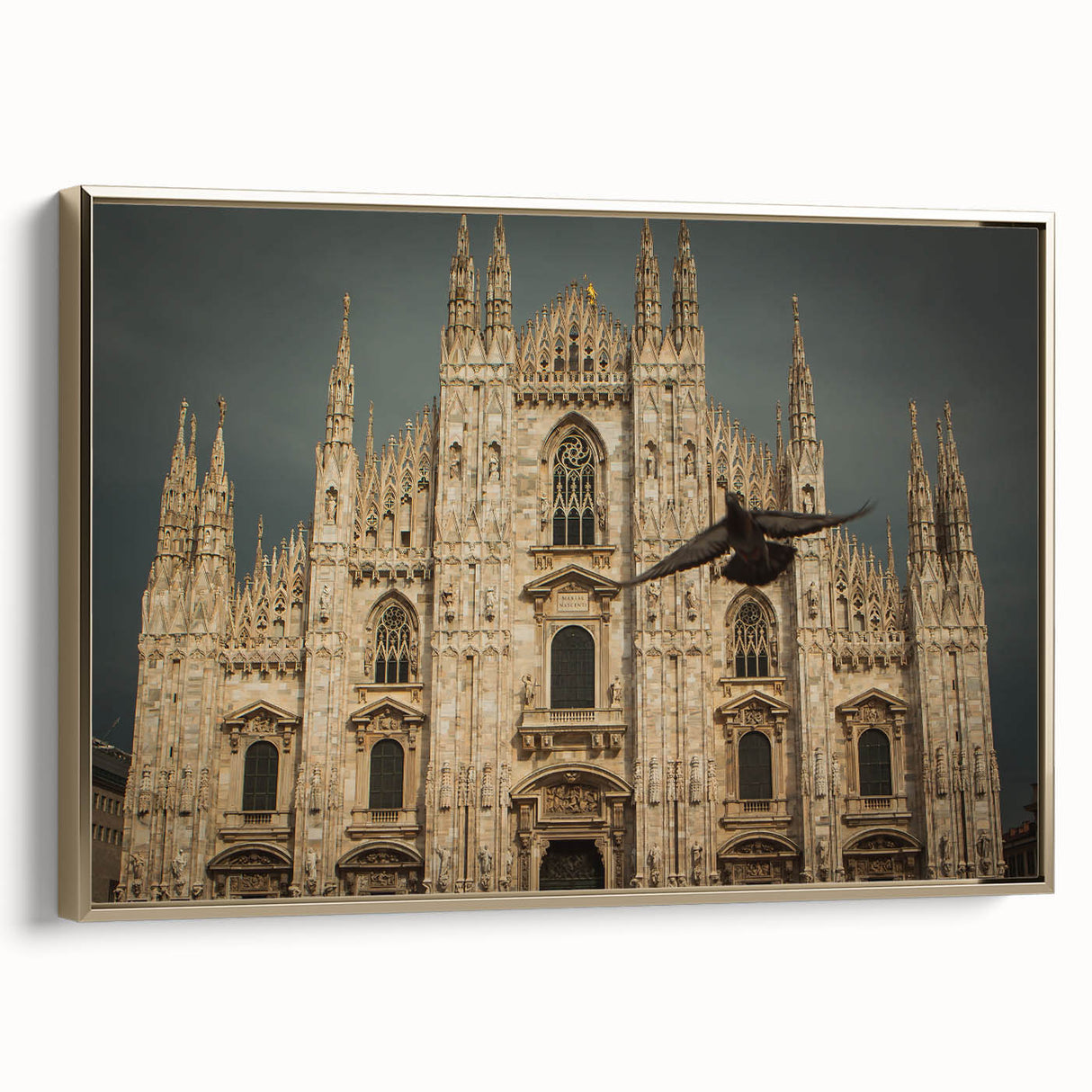 Framed canvas of a cathedral landscape art painting in muted gold and black tones.