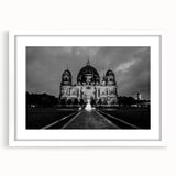 Abstract cathedral design in textured whites and grays on a large framed canvas, ideal for living room decor.