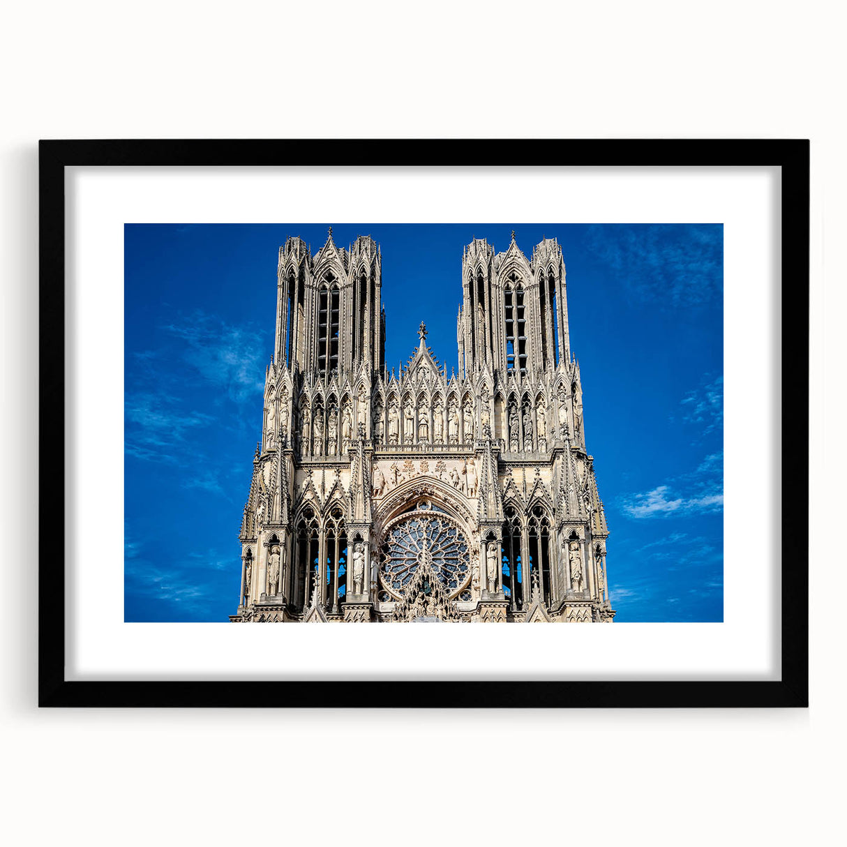 Extra large abstract art print of a colorful cathedral design with textured details on a black framed canvas.