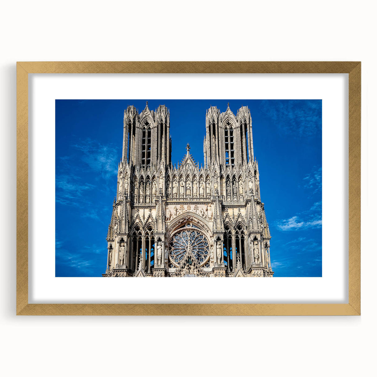 Textured abstract art print of a cathedral, in a gold frame with mat, using muted earth tones, suitable for bedroom decor.