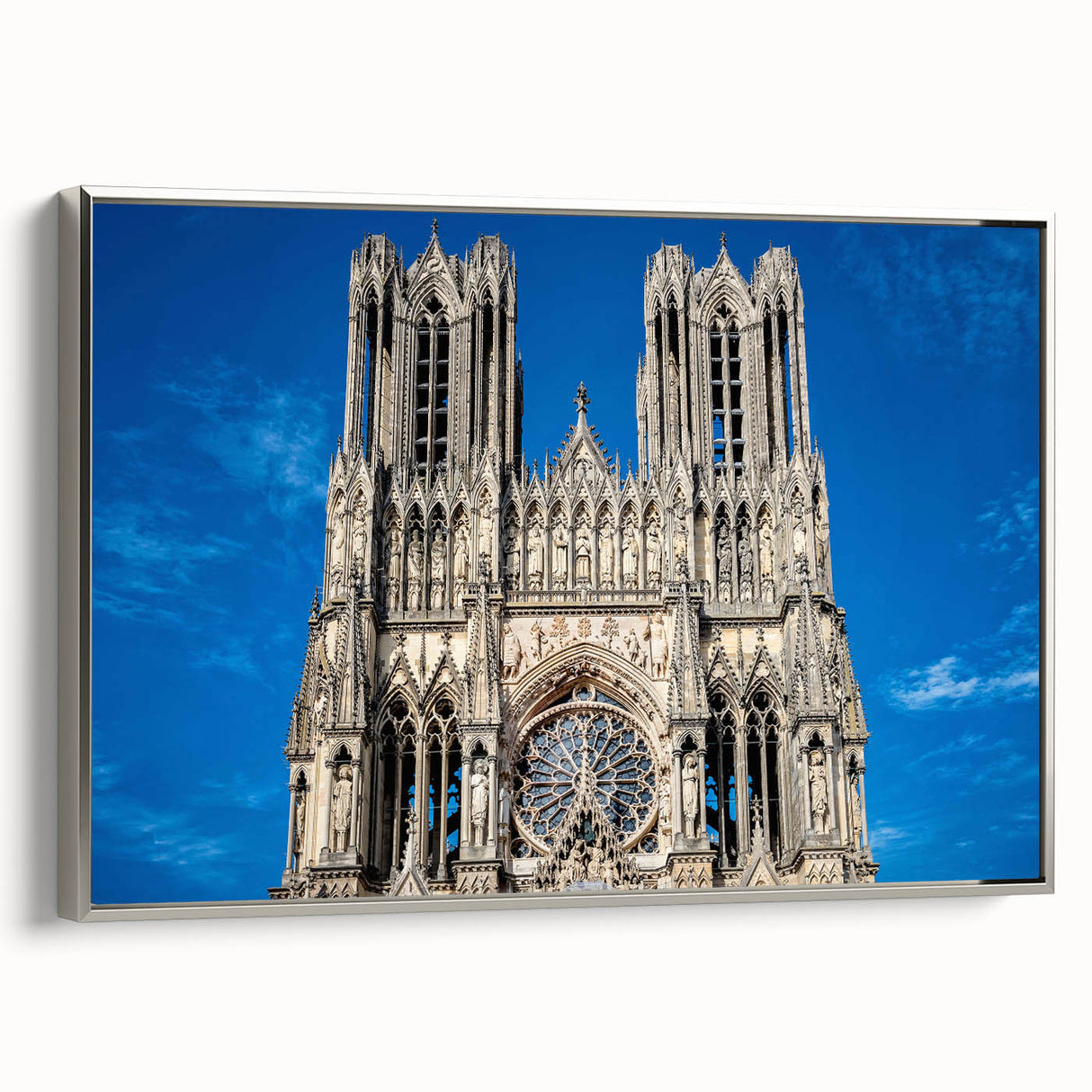 Vintage poster art of a cathedral in colorful art style, framed canvas in silver, ideal for living room wall decor.